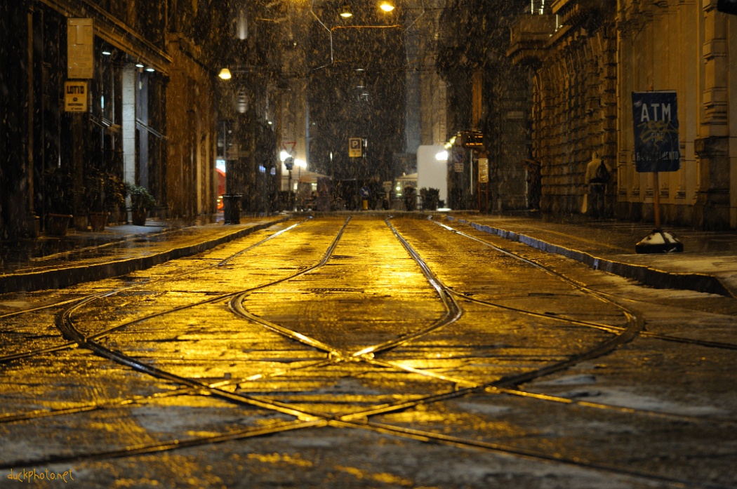 Night snowfall in Milan